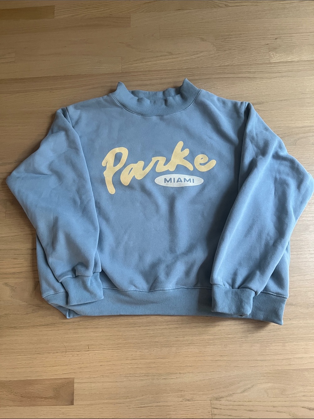 Parke Miami Light Blue Mockneck with Yellow Logo